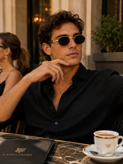 Lentes de sol  modernos negros con detalles dorado